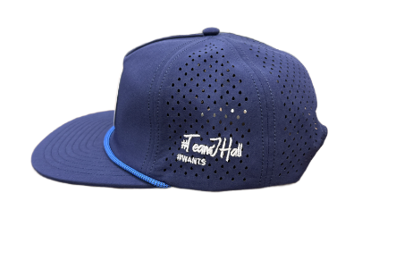 The alternate #TeamJHall navy snapback, angled toward the side to display the #TeamJHall and #Wants logo.