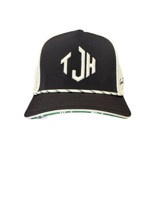 The navy and white #TeamJHall performance snapback facing forward with the TJH logo clearly visible.