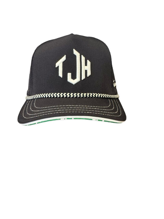 The navy blue #TeamJHall performance snapback facing forward with the TJH logo clearly visible.